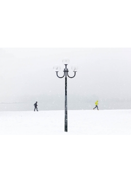 "Snowing on street light"